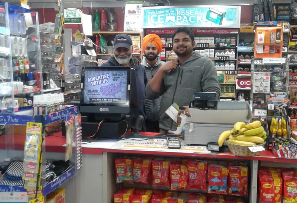 Raj Patel, owner of a thriving convenience store switched to cloud-based system payroll for small businesses. Photo by NRS.